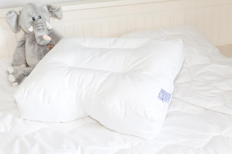 Uniquu Muototyyny sängyllä