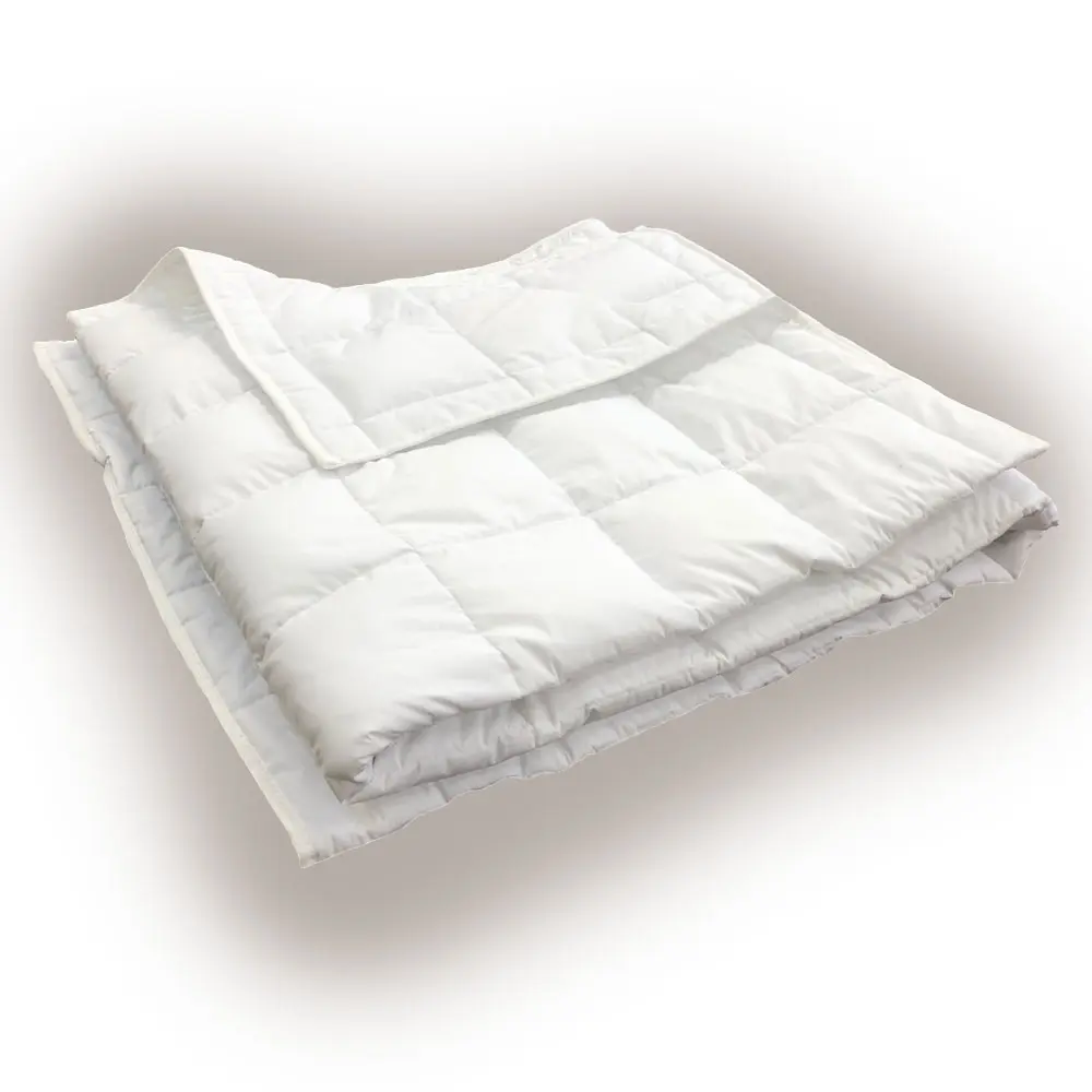 Uniquu painopeitto valkoinen. Painorakeet suljettu peiton sisään neliönmallisiin tikkaamaalla suljettuihin alueisiin.