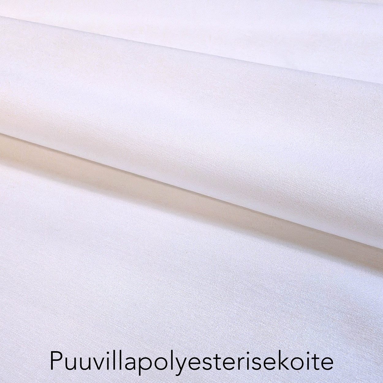 Puuvillapolyesterisekoite kangas lähikuva.